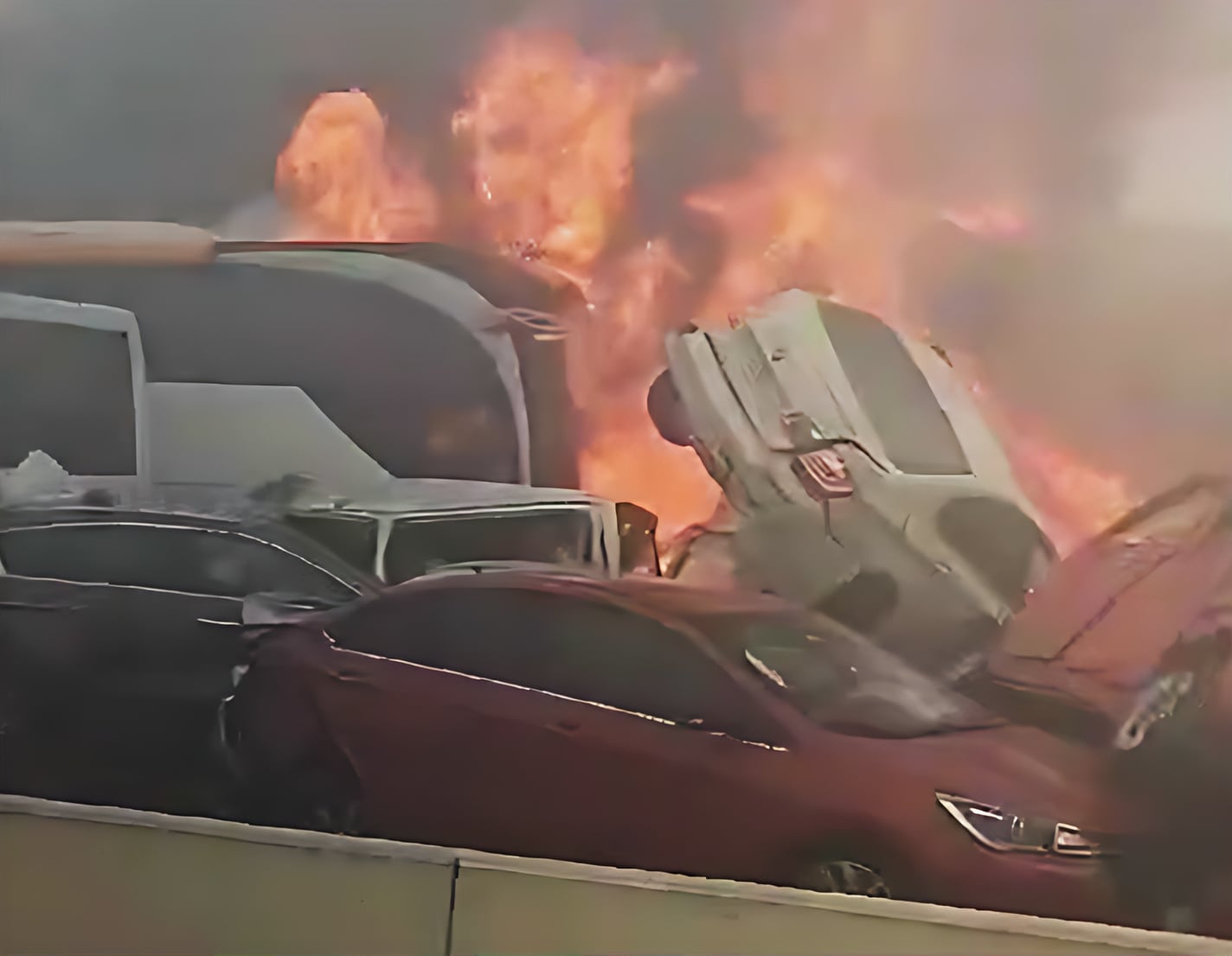 Burning vehicles in the Cairo-Alexandria fog pile-up